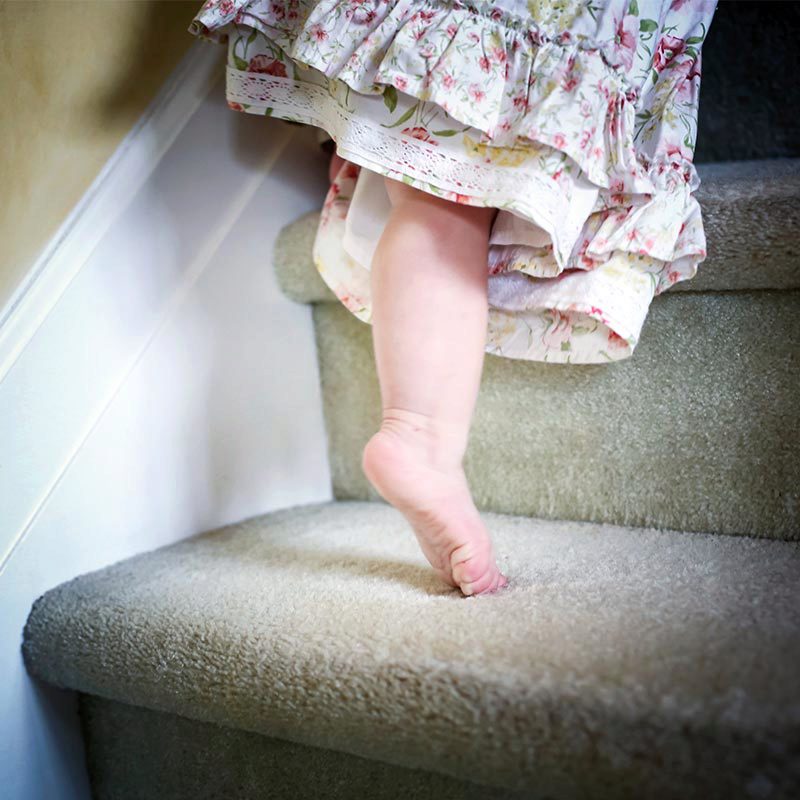 Baby walking up stairs
