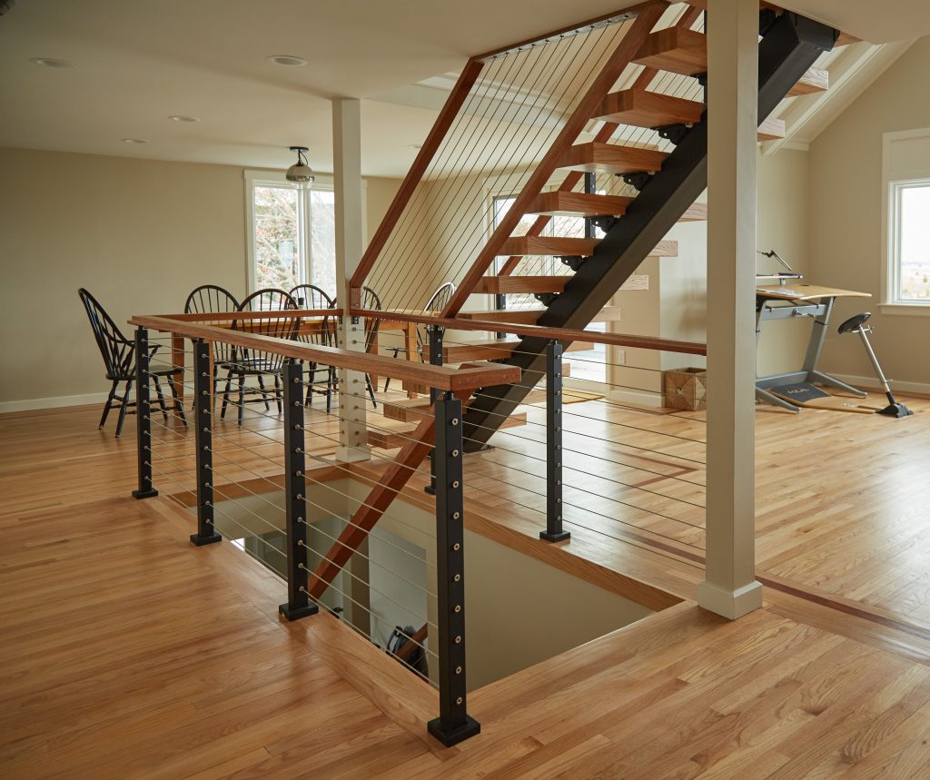 Viewrail Flight with wood handrail terminating into ceiling Viewrail Flight with wood handrail terminating into ceiling