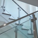 minimalistic glass system in brushed stainless from landing to 3rd story minimalistic glass system in brushed stainless from landing to 3rd story