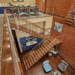 maple floating staircase in powder coat silver looking over a balcony maple floating staircase in powder coat silver looking over a balcony