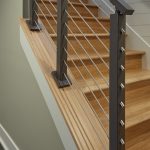 Stainless steel rod railing with black powder coat kneewall posts and handrail
